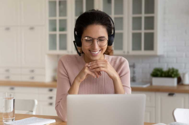 This is the image description Hybrid workplace image of woman in home office Encino