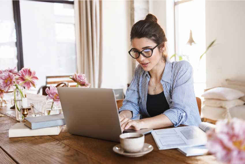 Woman in home office assessing AI Privacyt in Los Angeles